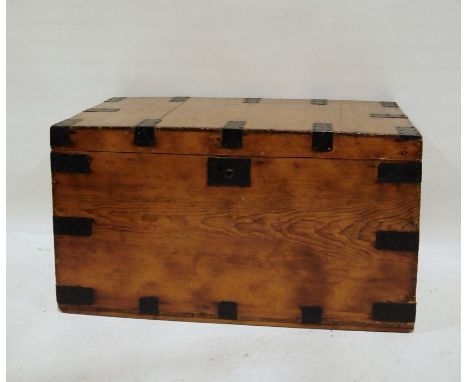 Pine and metal-bound trunk, 90cm x 50cm Condition ReportScratches, dents and wear throughout. Large chip front lower left edg