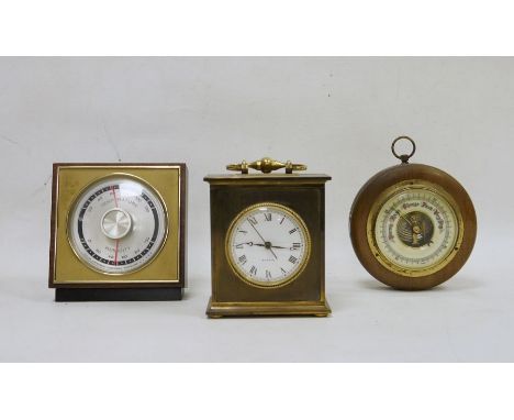 Oak cased wall-hanging barometer, a modern quartz mantel clock and a temperature and humidity gauge (3) 