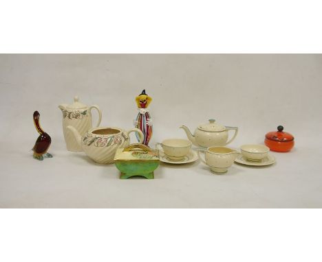 Susie Cooper part tea service painted with pink spots within green bands, comprising a teapot and cover, a milk jug and two t