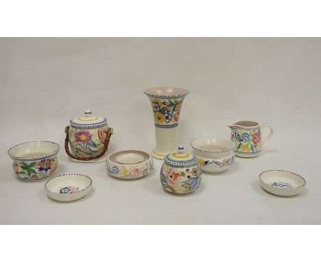 Collection of Poole pottery, mostly mid 20th century and later, boldly painted with colourful abstract flowers, printed impre