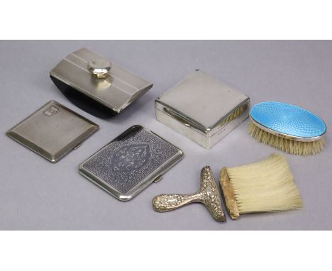A George V silver engine-turned pocket cigarette case, 8.4cm wide, London 1929 (3.2oz); a roller blotter with engine-turned s