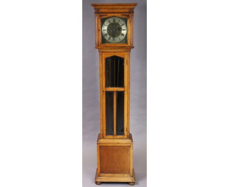 An early 20th century oak longcase clock. 