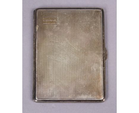 A George V silver engine-turned rectangular pocket cigarette case, 11.5cm x 8.5cm; Birmingham 1932, by D. Bros. (5.7oz). 