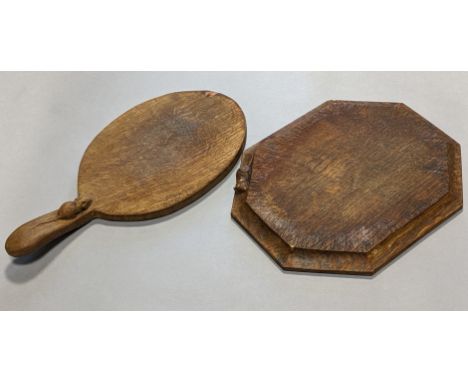 Two Robert “Mouseman” Thompson oak chopping boards: one oval with carved mouse to the handle, 37cm long x 18.5cm wide; &amp; 