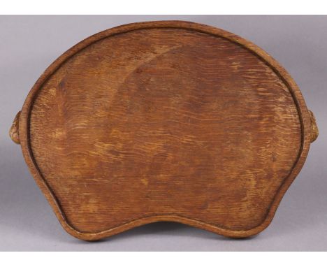 A Robert “Mouseman” Thompson oak kidney-shaped tray, with raised edge &amp; carved mice forming side handles, 47cm x 32cm, ci