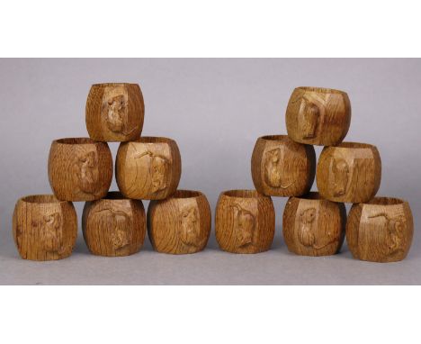 A set of twelve Robert “Mouseman” Thompson carved oak napkin rings, of octagonal form, 5cm high, circa 1950’s. 