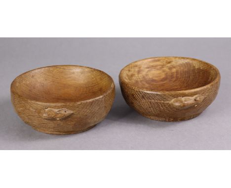 A pair of Robert “Mouseman” Thompson carved oak small circular bowls, each with adzed exterior, 14.5cm dia. x 5.5cm high, cir