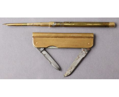A Sampson Mordan &amp; Co. 18ct. gold mounted pocketknife with two steel folding blades, engine-turned gold sides &amp; tubul