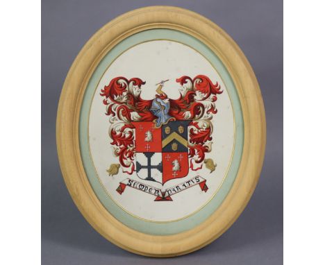 A 19th-century hand-coloured coat-of-arms heightened with gilt, on a white ground, gouache on panel (?), 25cm x 20cm (oval), 