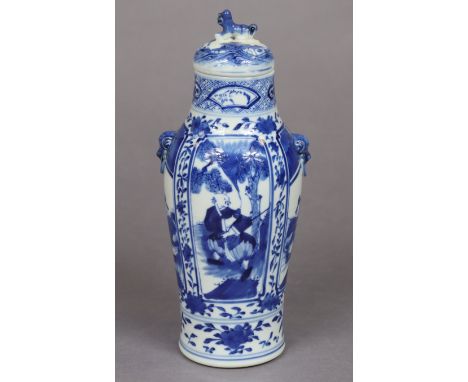 A 19th century Chinese blue &amp; white porcelain vase &amp; cover of slender baluster form, painted with figures in reserves