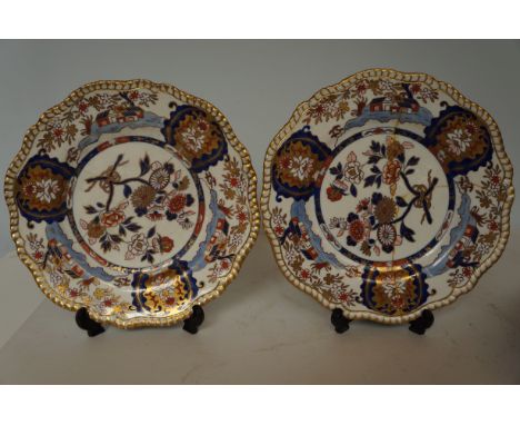 Pair of early Spode plates both with repairs