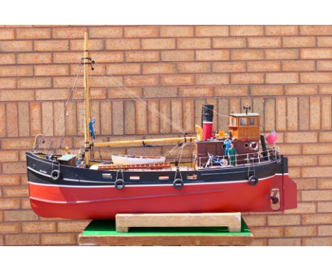 A radio controlled Clyde Puffer 'No Light'. The hand crafted vessel, similar in style to kits by Caldercraft, is built to an 