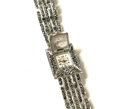 Silver ladies vintage cocktail watch, winds and ticks but no warranty given 