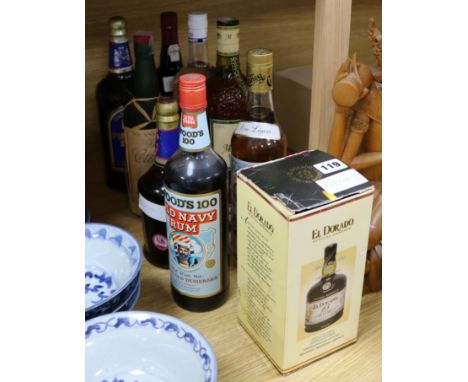 Nine assorted bottles of spirits including seven rums, Blue label Smirnoff and vintage port