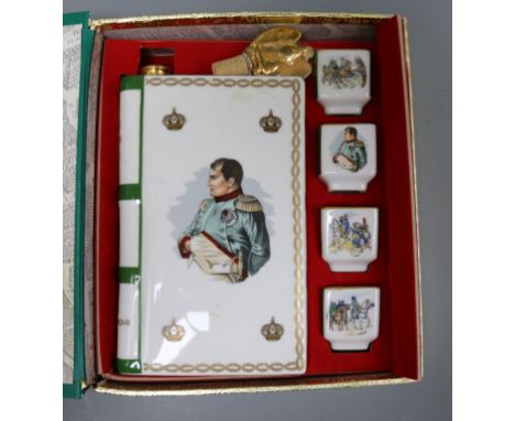 A boxed Baccarat glass Courvoisier decanter and stopper, (no contents) cognac and a cased Limoges Camus Napoleon Cognac (no c