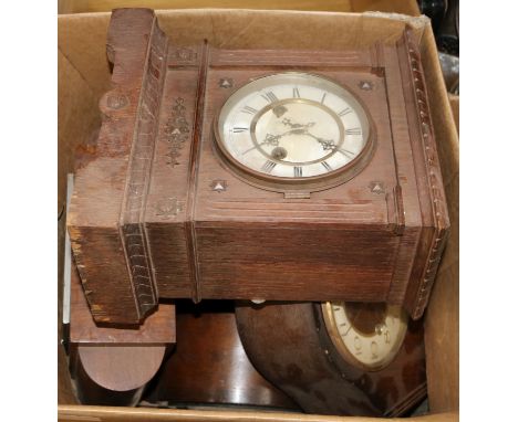 A box of assorted mantel clocks