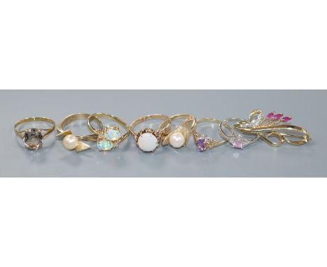 A modern 10ct gold, opal and diamond ring, six other gem set rings including five 9ct and a 9ct and gem set brooch, gross 16 