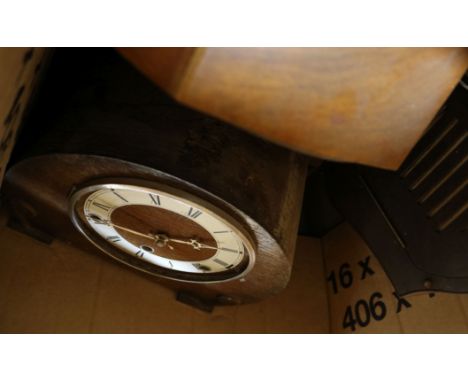A box of assorted mantel clocks