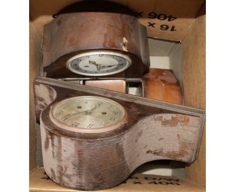 A box of assorted mantel clocks