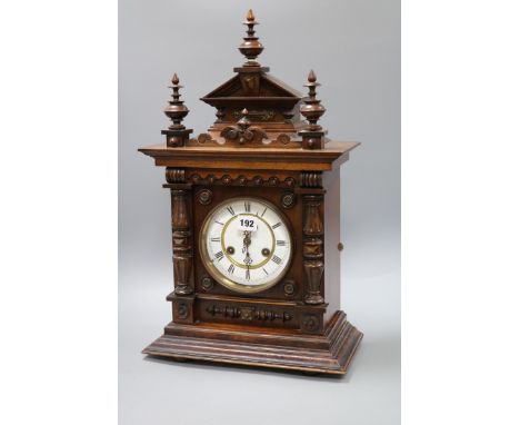 A walnut mantel clock height 56cm