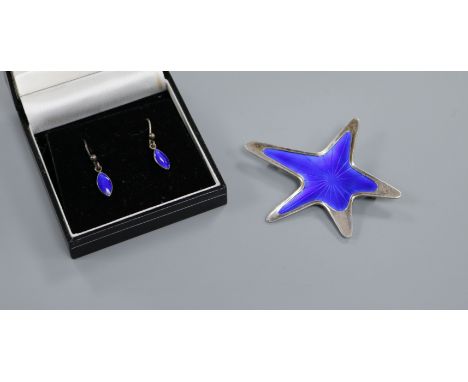 A Danish sterling and enamel star brooch by Meka and a pair of earrings.