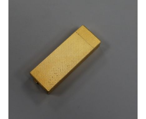 A Cartier gold plated lighter