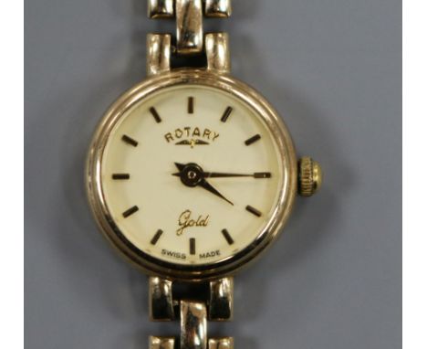 A lady's 9ct gold Rotary manual wind wrist watch, on a 9ct gold bracelet.