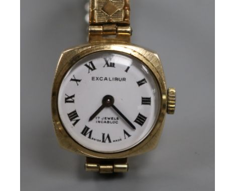 A lady's 9ct gold Excalibur manual wind wrist watch.