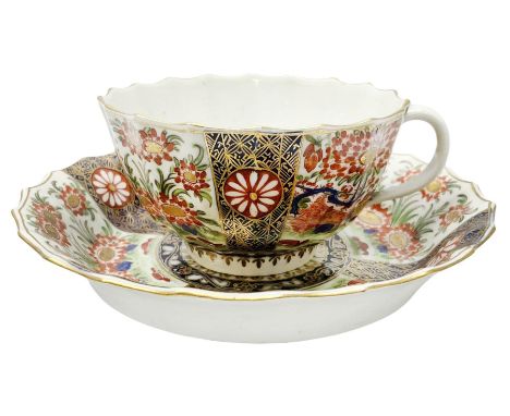 18th century Worcester teacup and saucer, circa 1770, of faceted form decorated in the Japanese Kakiemon style, similar to th