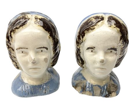 Pair 19th century Scottish pottery furniture rests, circa 1860, probably depicting Florence Nightingale, decorated in polychr