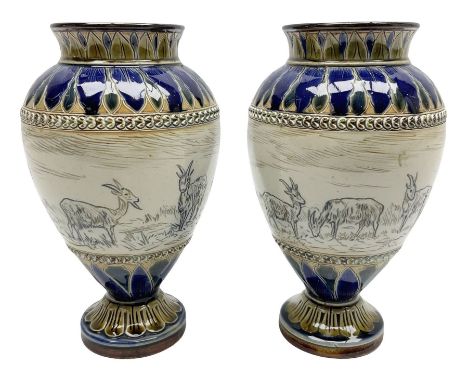 Pair of late 19th century Doulton Lambeth sgraffito vases decorated by Hannah Barlow, each of ovoid form with short neck, upo