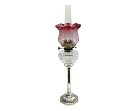 20th century Hawksworth, Eyre &amp; Co silver plated oil lamp, the octagonal stepped base with engraved dedication, leading t