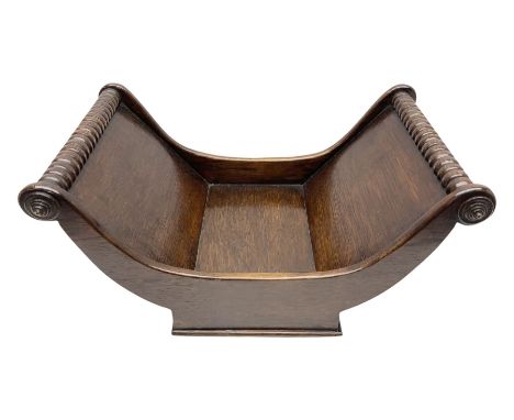 19th century mahogany cheese coaster, of typical curved form with turned bobbin ends, H19.5cm L40.5cm D26.5cmCondition Report