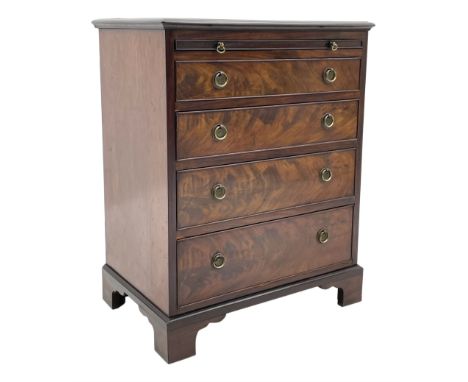 Small Georgian style mahogany bachelor's chest, the moulded rectangular top over slide and four graduating drawers with hardw