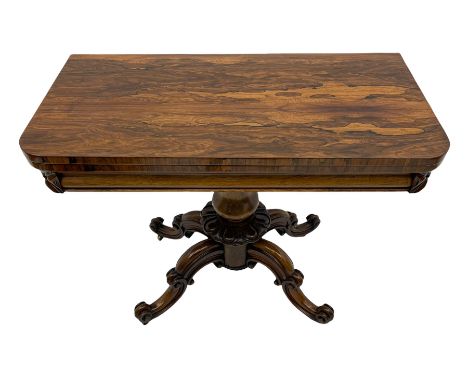 Victorian figured rosewood card table, fold-over swivel top with circular baize lining, moulded frieze with stylised flower h