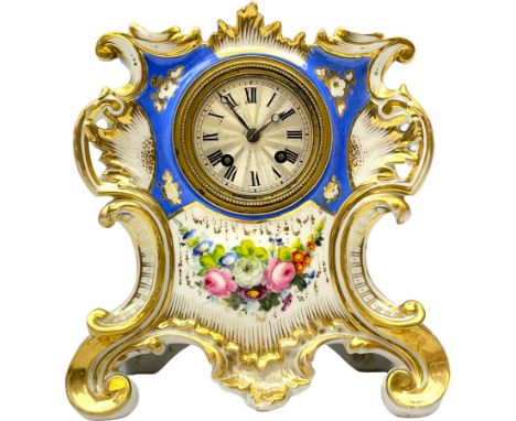 Early 19th century c1820 continental porcelain mantle clock in the Sevres Rocco style, decorated to the front with fired gild