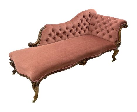 Victorian walnut framed chaise longue, deep double serpentine seat with moulded and cartouche carved apron, scrolled back car