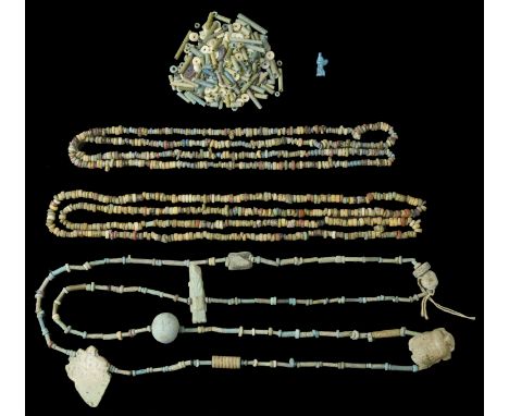 Egyptian, Faience Beads strung together as a necklace with a few amulets, c. 600 BC; another two necklaces of multicoloured b