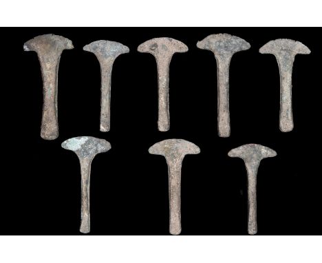 Celtic, bronze miniature votive Axe Heads (8), c. 4th-1st cent. BC, various sizes, largest 4.8cm x 2.5cm, smallest 4.1cm x 2.