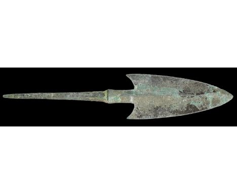 Bronze-Age, Luristan, large Arrowhead, 8th cent. BC, 14.2cm x 3cm, with central rib and curved barbs and extended tang. Intac