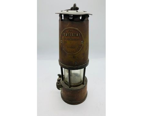 Miners lamp by Protector Lighting Co of Eccles Manchester 