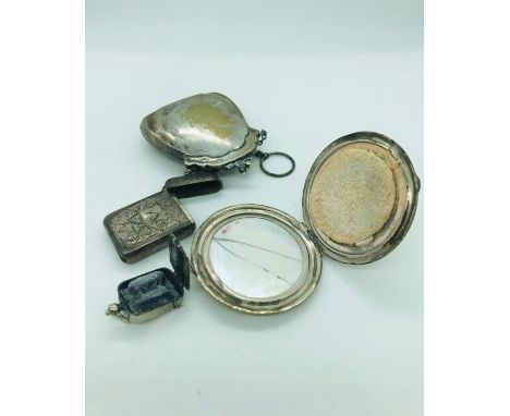A small selection of white metal items to include purse, vesta, compact etc.