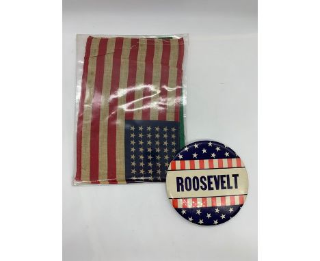 A President Roosevelt Metal Campaign WWII signed on reverse by the President and a small American flag, comes with a statemen