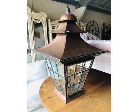 A Very large copper and leaded glass Victorian lantern style light with large industrial style bulb with hanging chain (W70cm