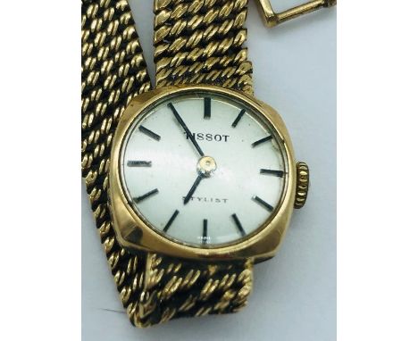 A Ladies 9ct gold Tissot watch (19g) 
