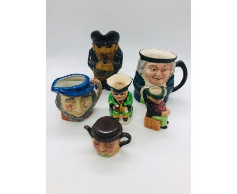  A Selection of toby jugs with a small toby teapot 