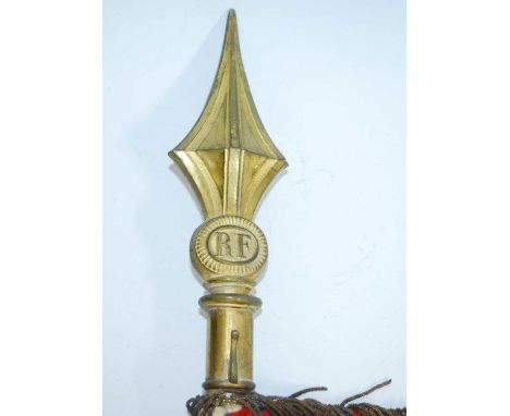 An early 20th century French silk flag on a turned wooden two section pole with brass finial marked RF, the base section with