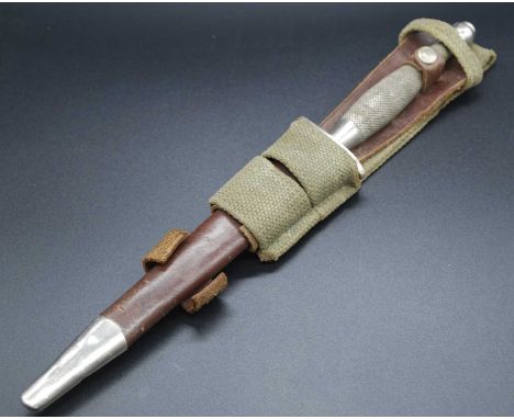 A Fairbairn-Sykes 1st Pattern Commando fighting knife, the 17cm double edged spear-point blade marked to the ricasso The F-S 