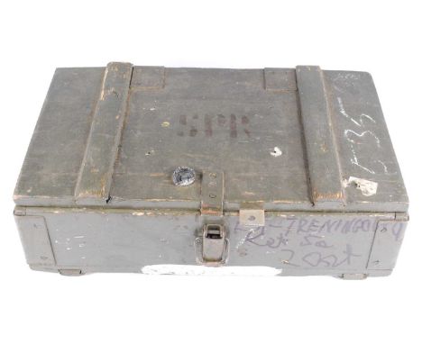 A WW II Polish green painted grenade trunk, the hinged lid with inventory, the case with 20 slatted wooden divisions