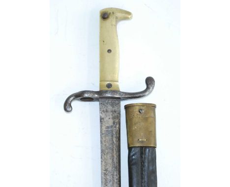 An Imperial German M1871 bayonet, the 46.5cm straight fullered blade marked to the forte Gebr Weyersberg Solingen, having a s